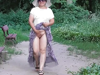 Wife at hand transparent dress at hand public park